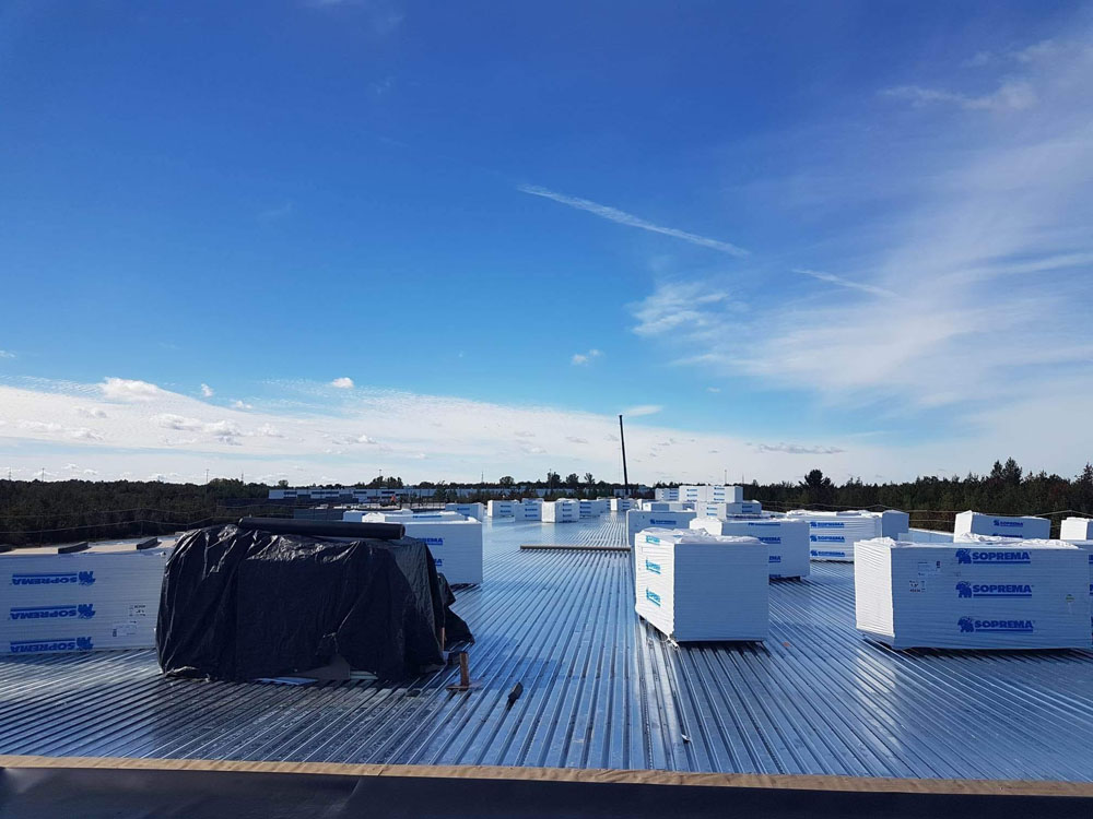 spécialisée en travaux de toiture plate